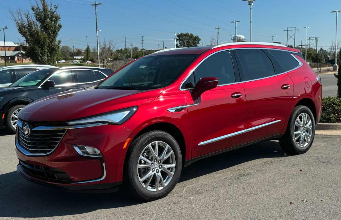 Red Buick Enclave parked outside Crain Buick GMC of Conway